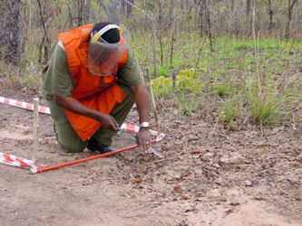 Deminer conducting the Manual Clearance Drill
